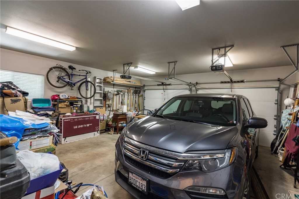 7703 Forest Drive Fish Camp, CA 93623 - Photo 39 of 48 a view of car garage