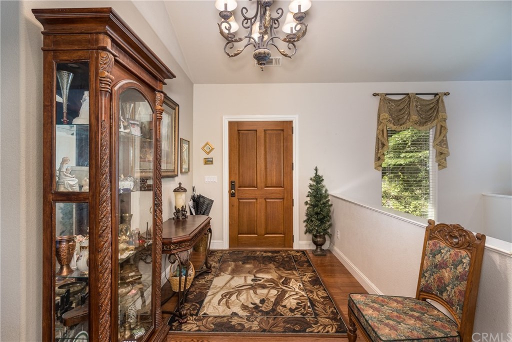 7703 Forest Drive Fish Camp, CA 93623 - Photo 6 of 48 a living room with furniture and a window