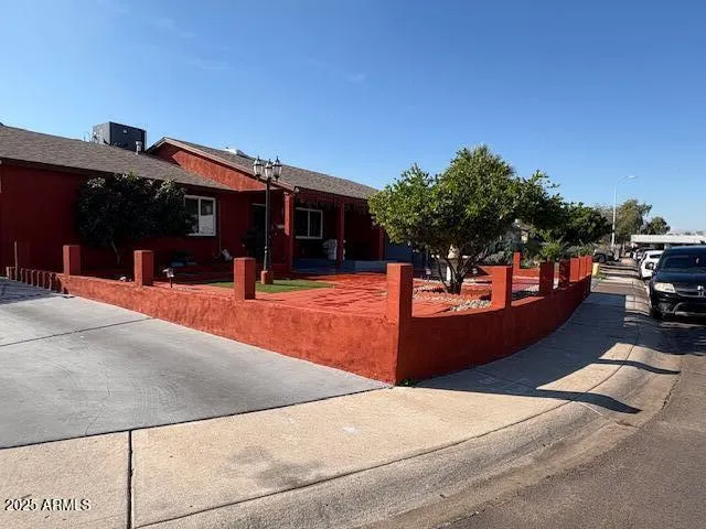 a view of a swimming pool with an outdoor seating