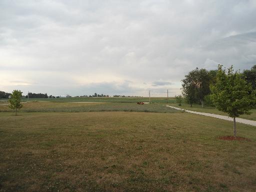 23319 Lucas Road DeKalb, IL 60115 - Photo 14 of 14 a view of an lake and a mountain