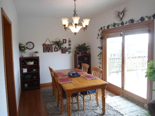 23319 Lucas Road DeKalb, IL 60115 - Photo 5 of 14 a view of a dining room with furniture window and outside view
