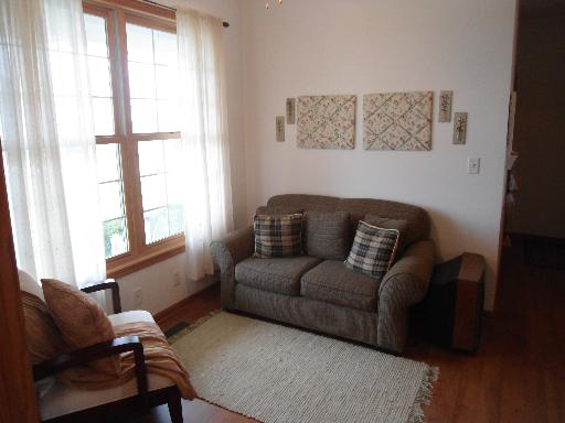 23319 Lucas Road DeKalb, IL 60115 - Photo 6 of 14 a living room with furniture and a window