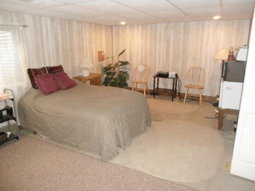 23319 Lucas Road DeKalb, IL 60115 - Photo 9 of 14 a large white bed in a white room