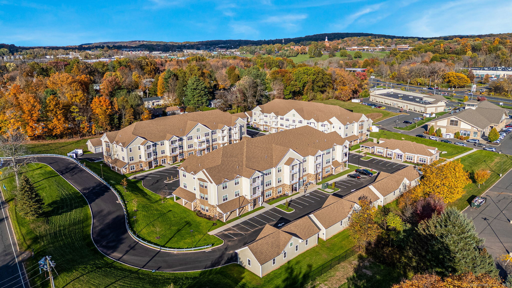 104 Episcopal Road, Unit 3 Berlin, CT 06037 - Photo 1 of 20 an aerial view of a house with a swimming pool