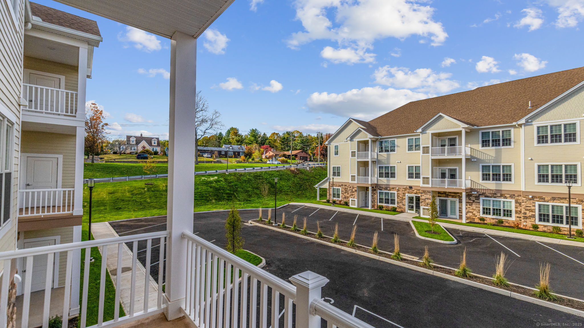 104 Episcopal Road, Unit 3 Berlin, CT 06037 - Photo 16 of 20 a view of a city from a balcony