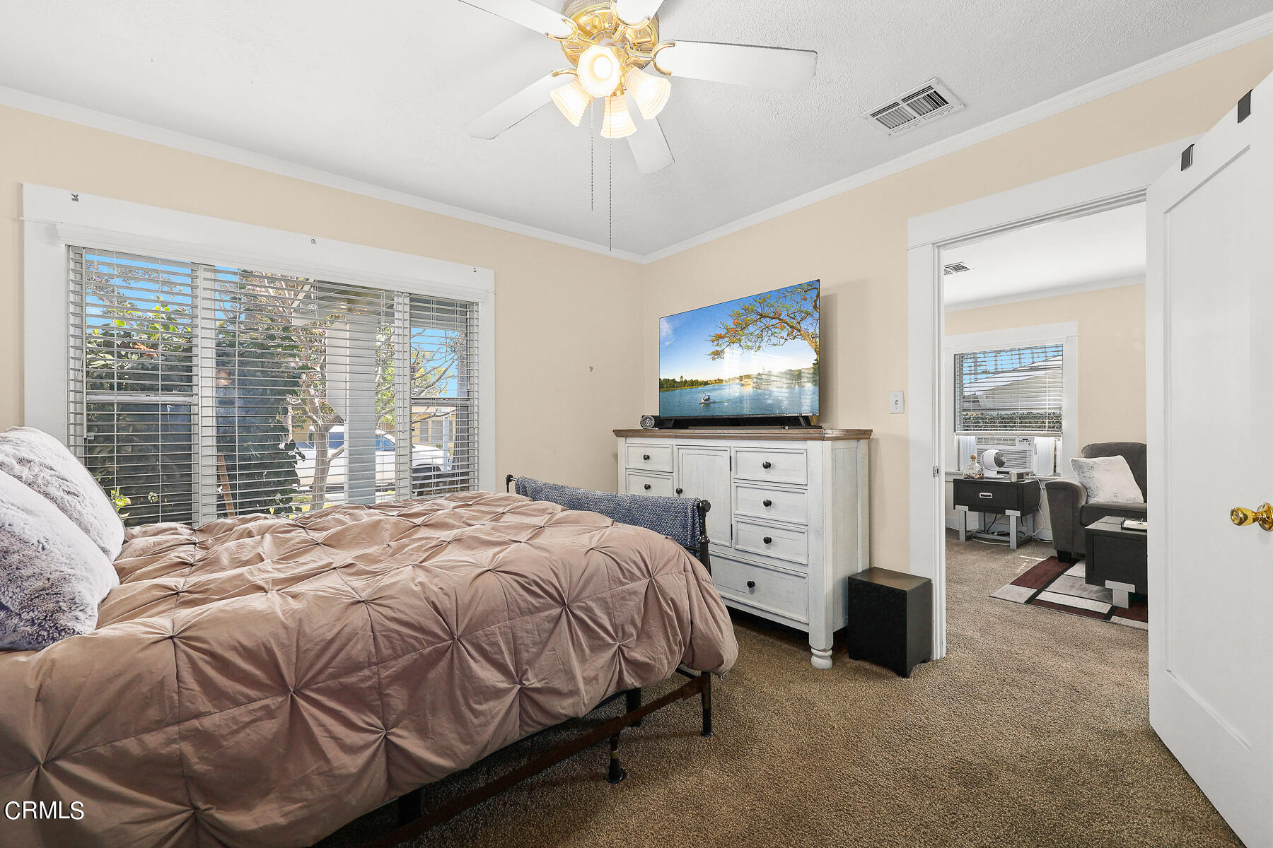 1159 Western Avenue Glendale, CA 91201 - Photo 17 of 52 a bedroom with a bed and a flat screen tv