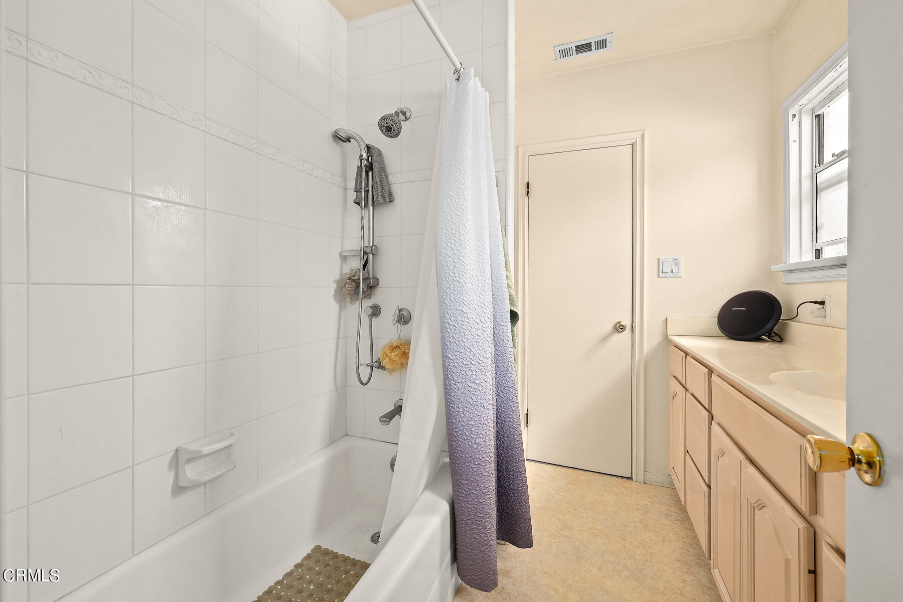 1159 Western Avenue Glendale, CA 91201 - Photo 19 of 52 a bathroom with a tub and shower