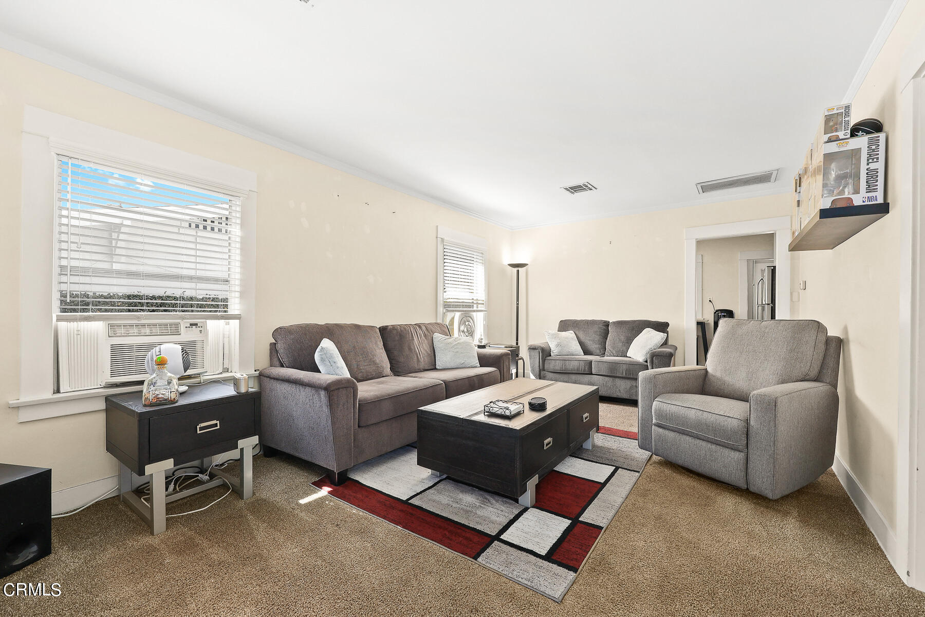 1159 Western Avenue Glendale, CA 91201 - Photo 7 of 52 a living room with furniture a large window and a table