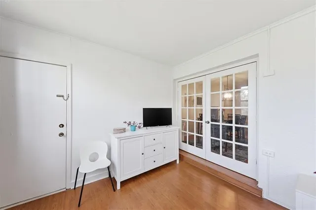 a view of a livingroom with furniture and a window