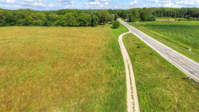 a view of a lake with a yard