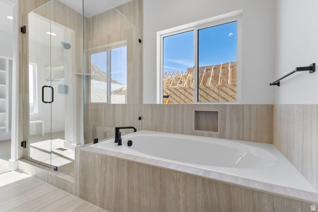 710 East Mountain Road North Ogden, UT 84414 - Photo 16 of 36 Full bathroom with a stall shower, a bath, and plenty of natural light