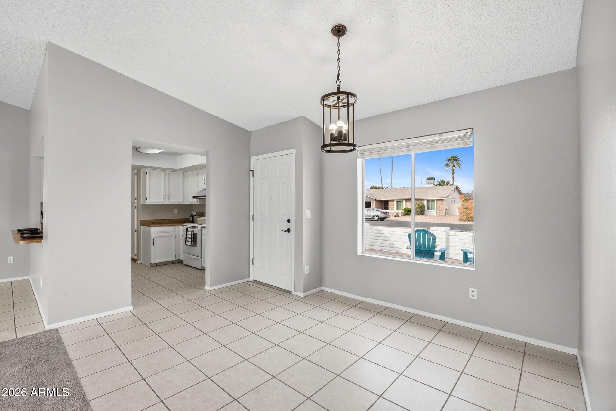 5917 East Hearn Road Scottsdale, AZ 85254 - Photo 13 of 28 a view of a kitchen and a sink dishwasher and microwave