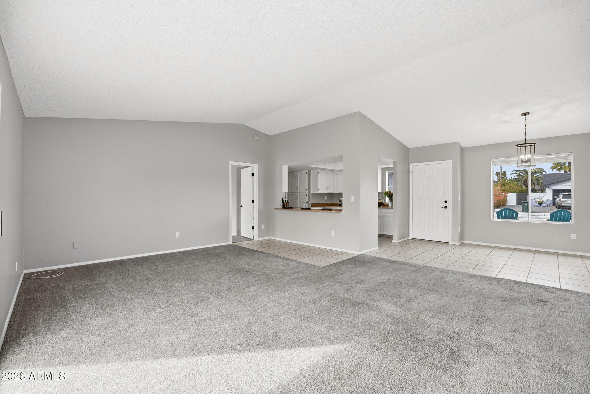 5917 East Hearn Road Scottsdale, AZ 85254 - Photo 14 of 28 an empty room with closet and mirrors