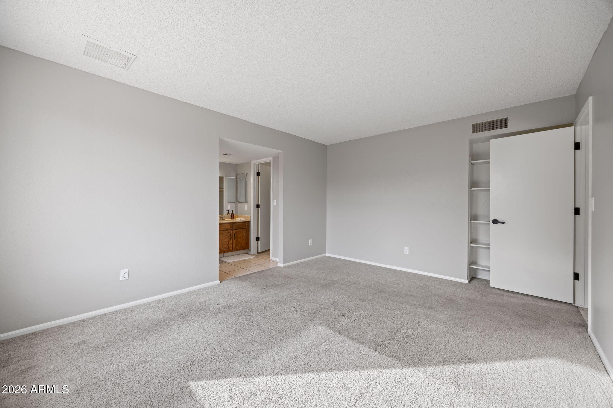 5917 East Hearn Road Scottsdale, AZ 85254 - Photo 18 of 28 a view of an empty room and a window