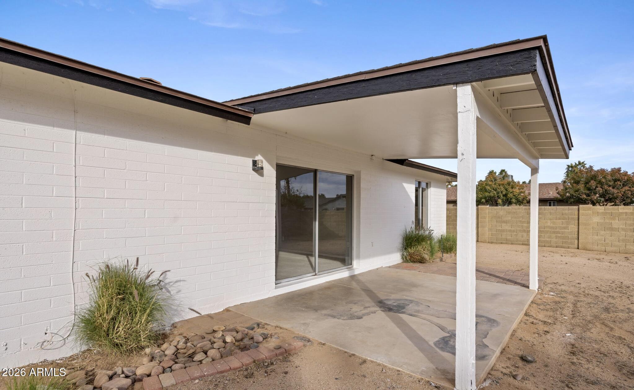 5917 East Hearn Road Scottsdale, AZ 85254 - Photo 26 of 28 a view of a porch with a backyard