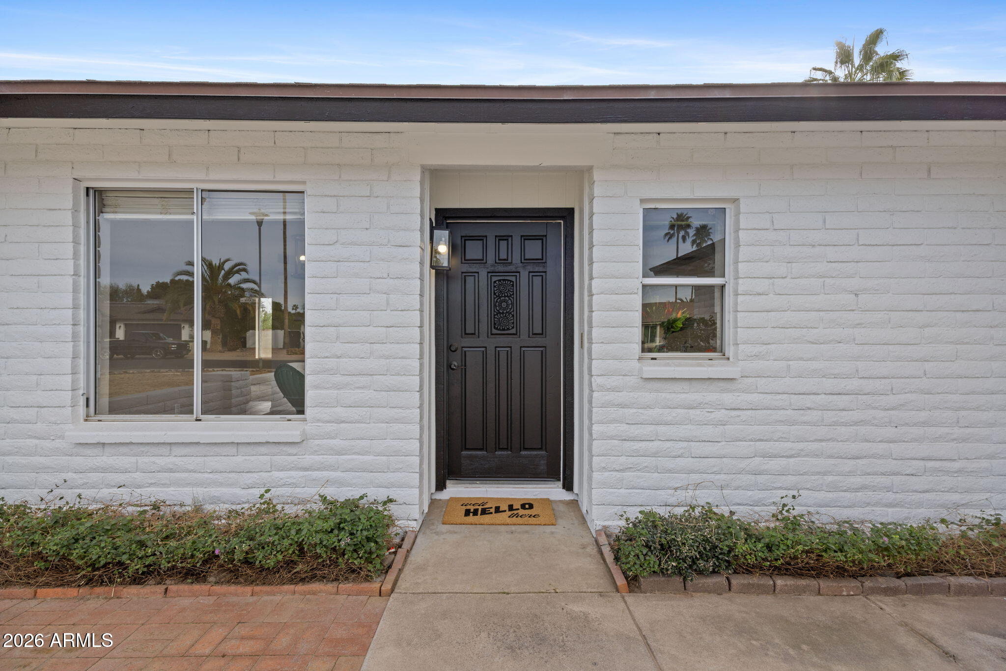 5917 East Hearn Road Scottsdale, AZ 85254 - Photo 8 of 28 a view of a entryway door front of house