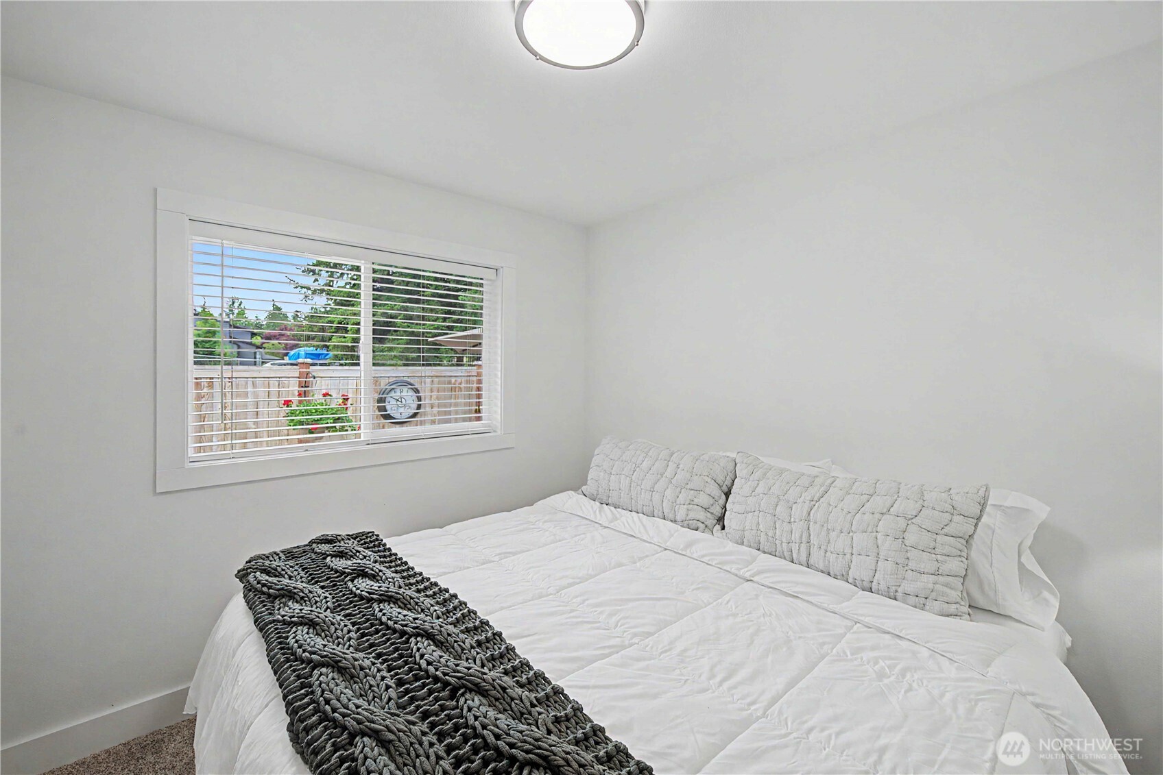 20919 Ronning Road Arlington, WA 98223 - Photo 13 of 28 a bedroom with a bed and a window