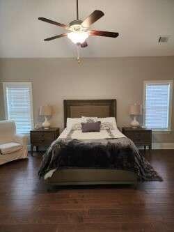 194 Yorkshire Lane Villa Rica, GA 30180 - Photo 8 of 20 a bedroom with a bed and wooden floor