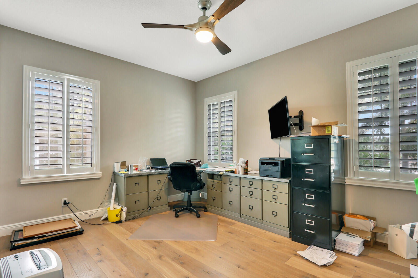 101 St Pierre Way Jupiter, FL 33458 - Photo 24 of 57 a view of a workspace with furniture and a window