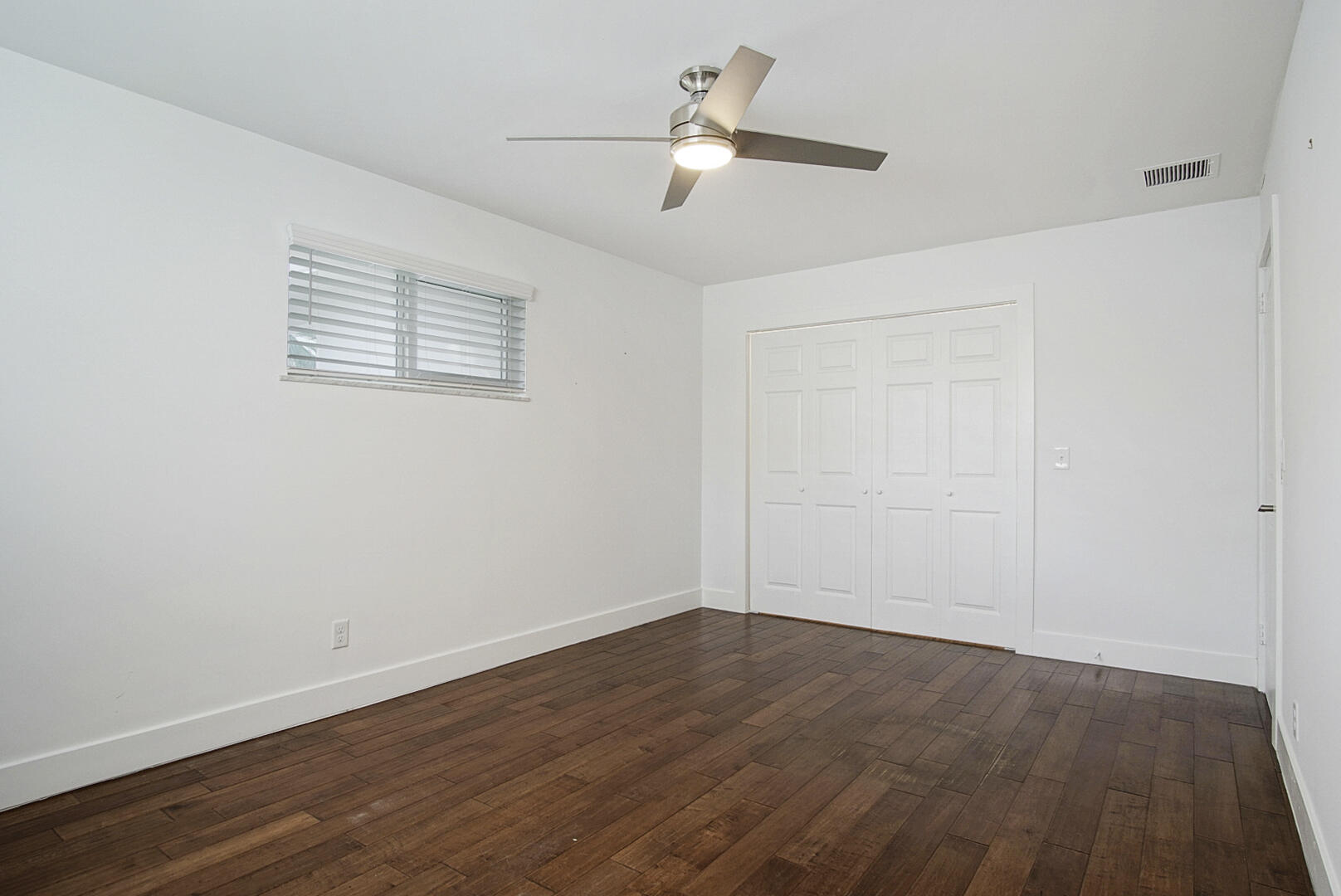 924 Pompano Drive Jupiter, FL 33458 - Photo 28 of 36 wooden floor in an empty room