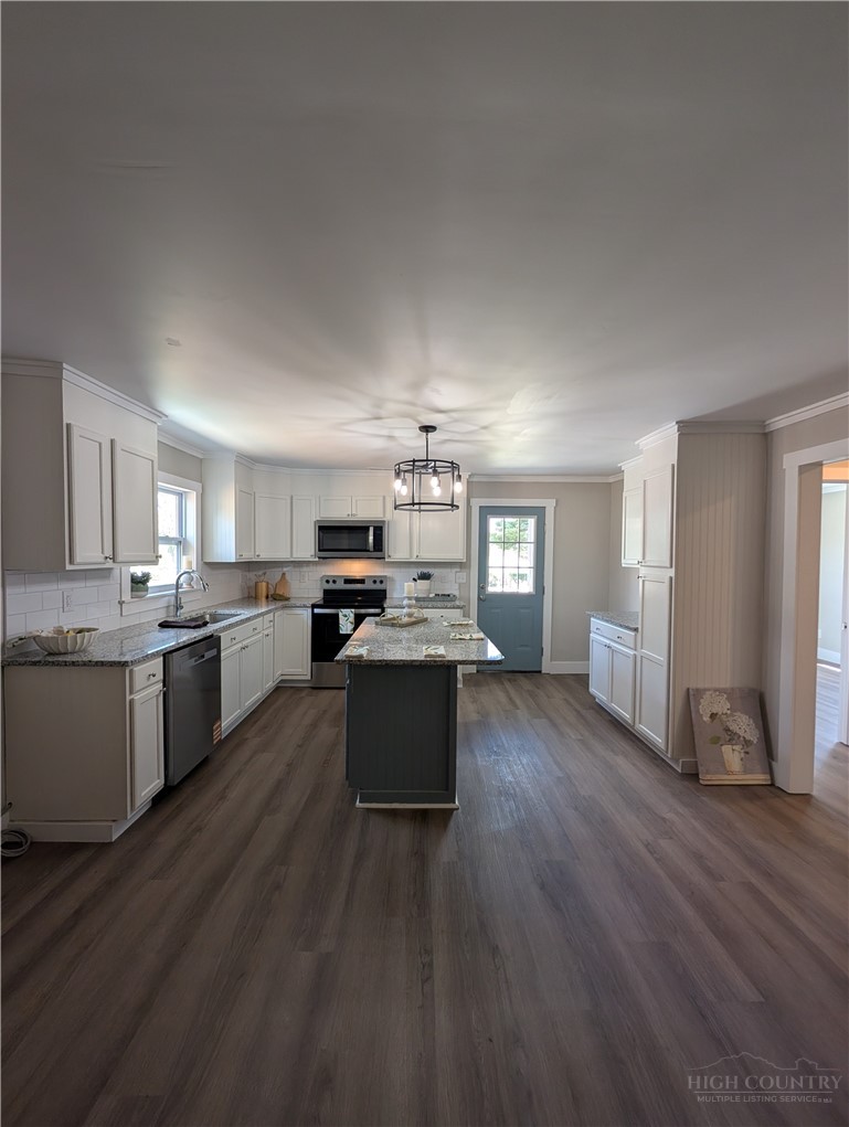 68 Estep Street Sparta, NC 28675 - Photo 6 of 21 a large kitchen with a lot of counter space