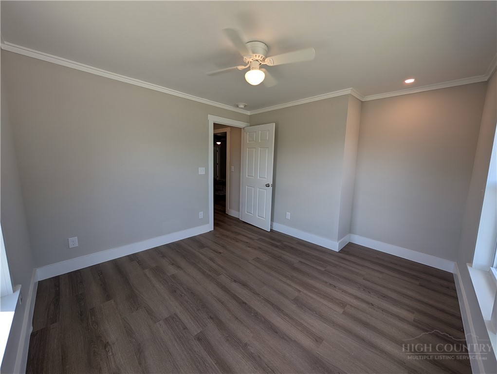 68 Estep Street Sparta, NC 28675 - Photo 9 of 21 a view of an empty room with wooden floor