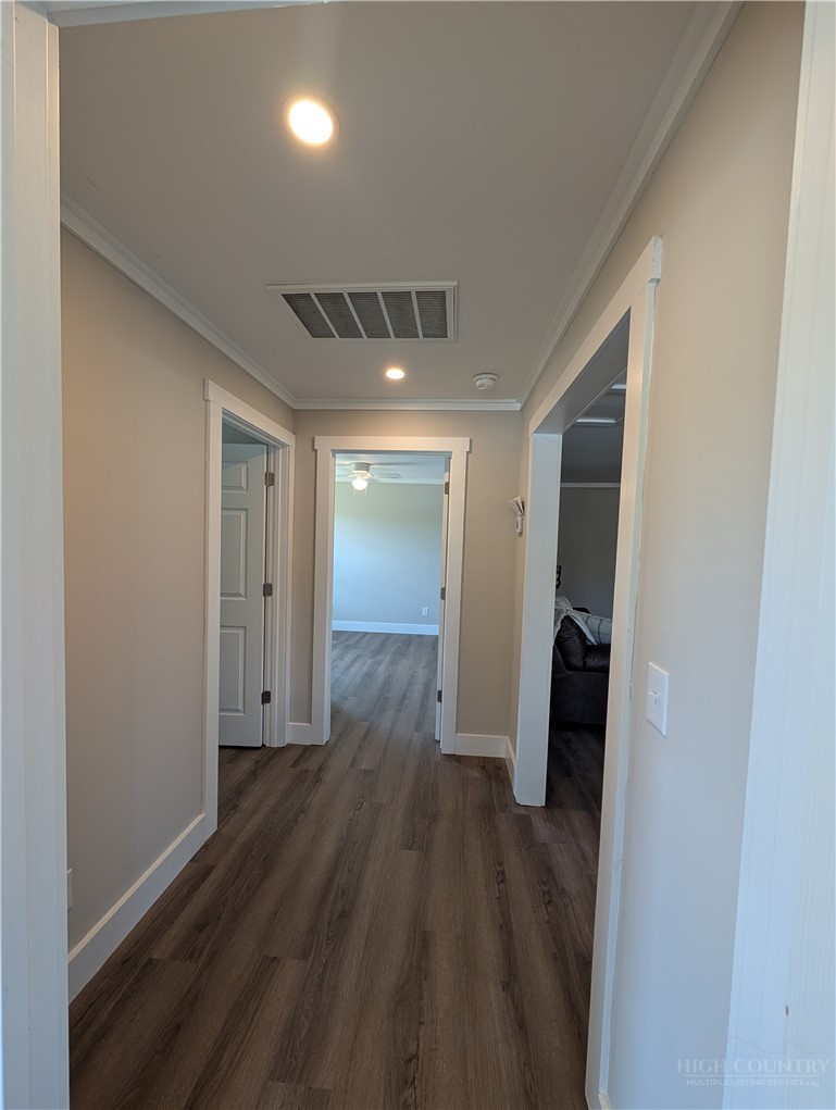 68 Estep Street Sparta, NC 28675 - Photo 10 of 21 a view of hallway with wooden floor