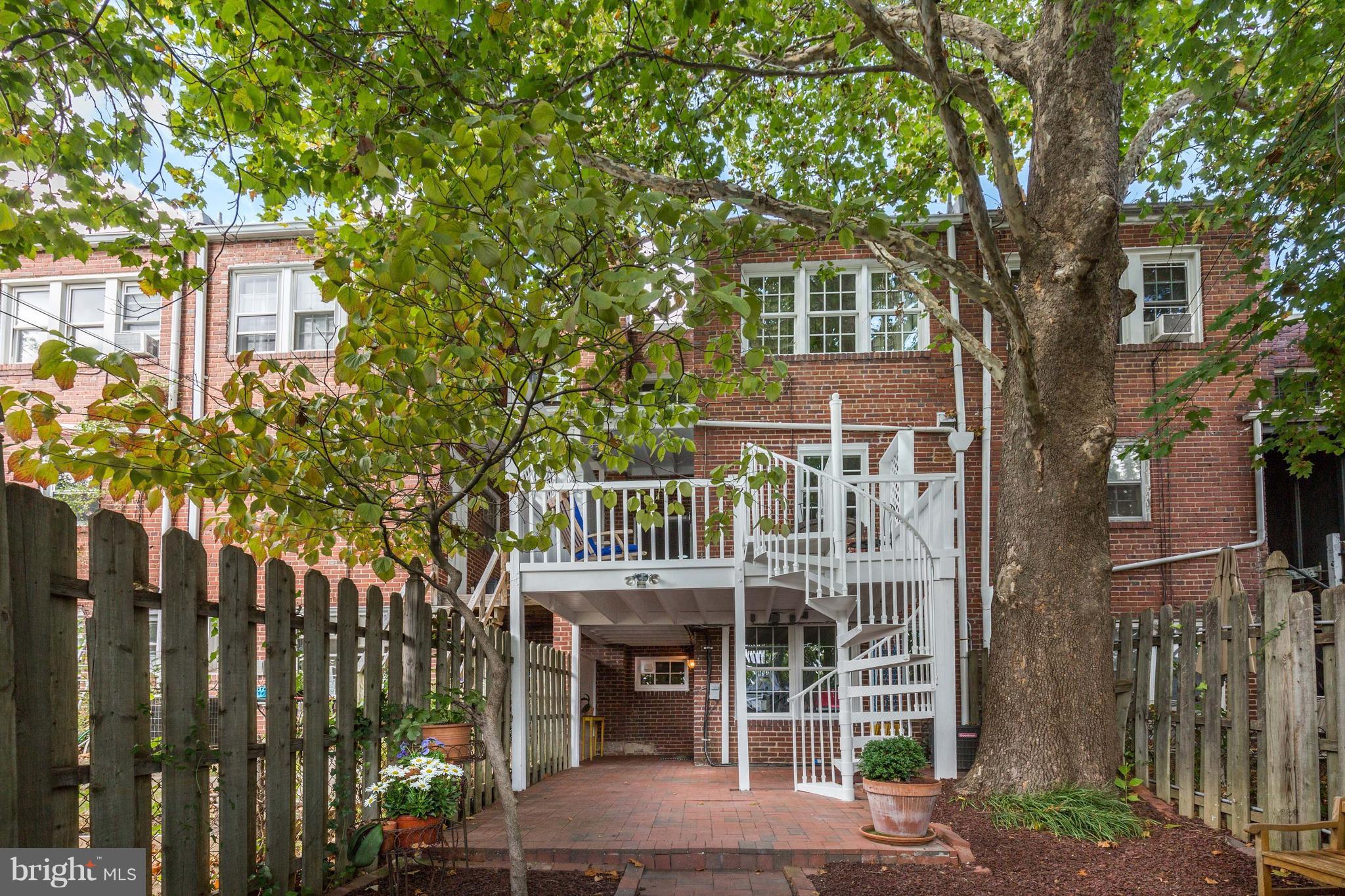 3816 Calvert Street Northwest Washington, DC 20007 - Photo 28 of 30 Lovely rear area with brick patio and play spaces
