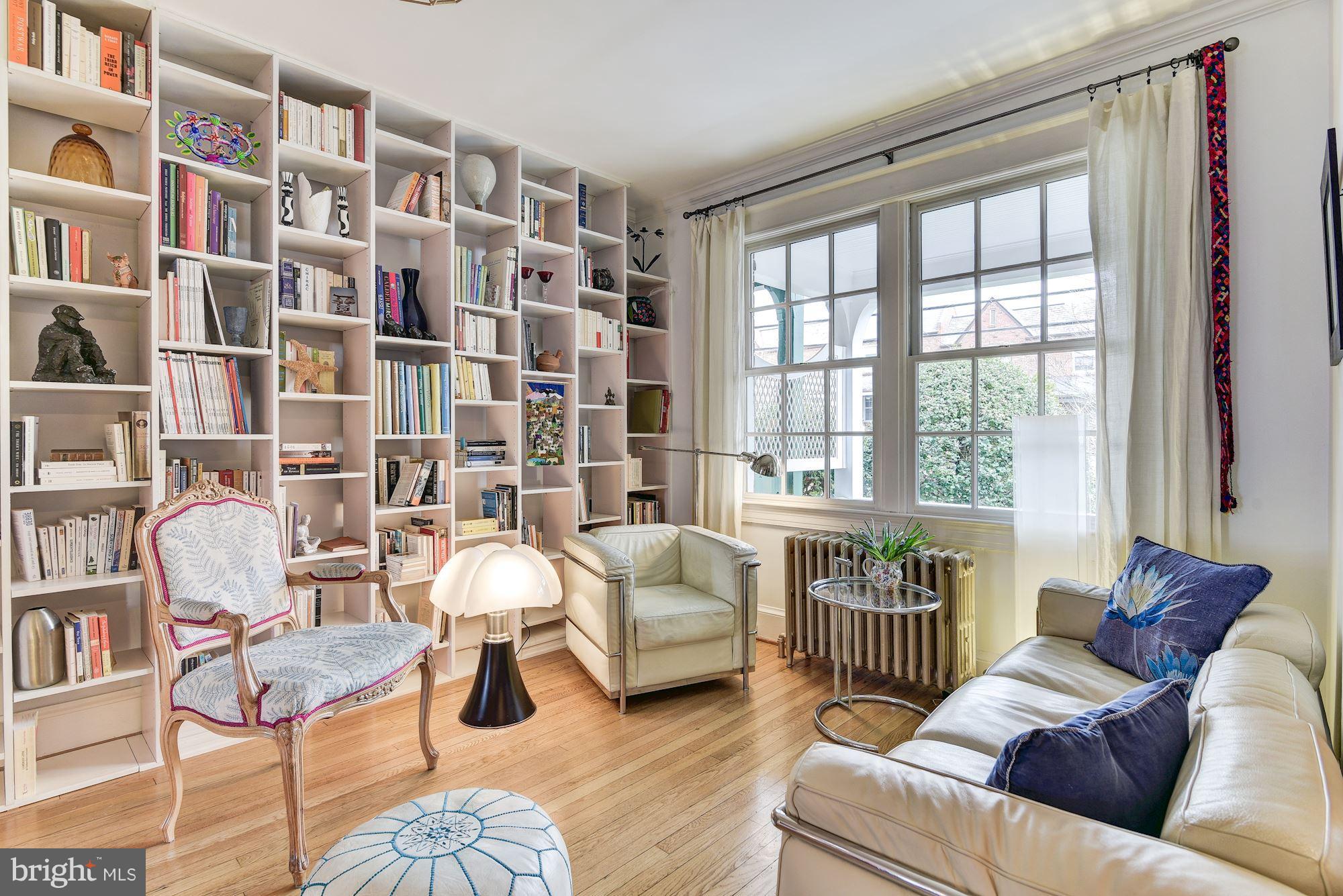 Living Room with custom wall shelving