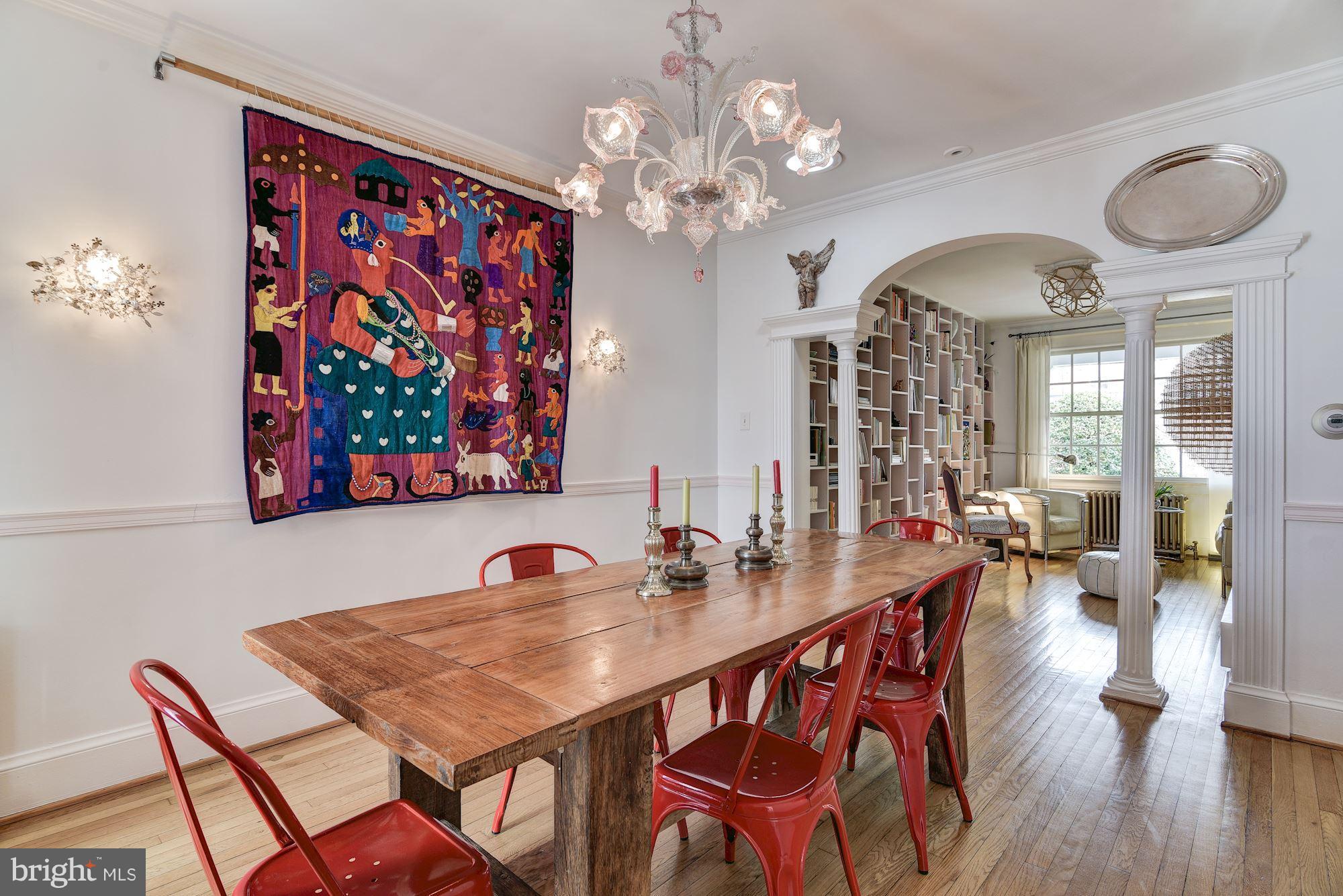 3816 Calvert Street Northwest Washington, DC 20007 - Photo 8 of 30 Formal dining room with arched doorway and pillars