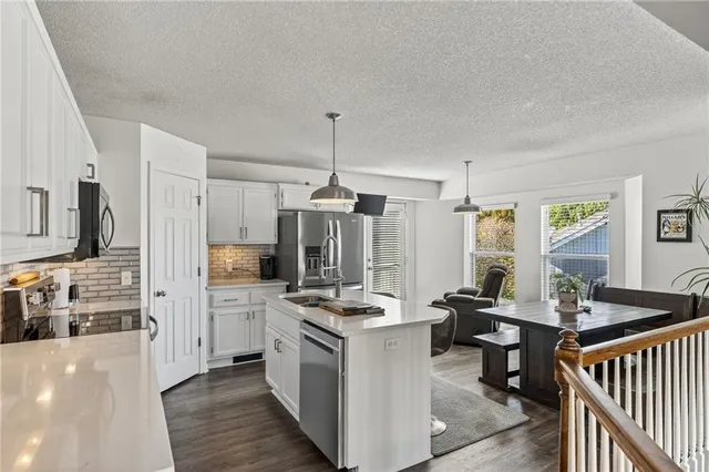 $365,000 | 9305 Northeast Paw Paw Drive, Kansas City, MO 64157