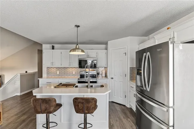 $365,000 | 9305 Northeast Paw Paw Drive, Kansas City, MO 64157