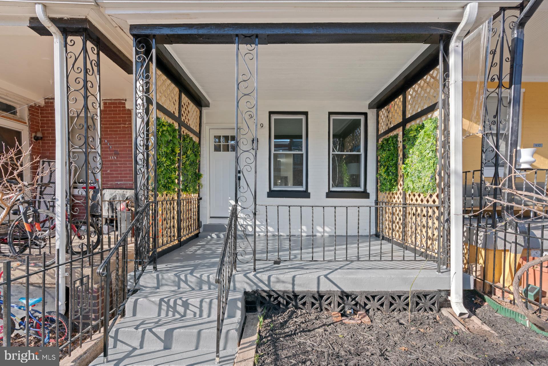 939 Shepherd Street Northwest Washington, DC 20011 - Photo 4 of 45 a view of a house with a porch