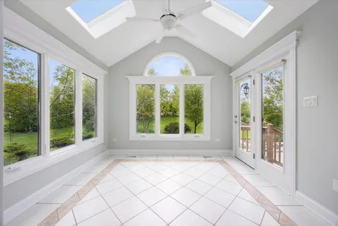 a view of a room with windows