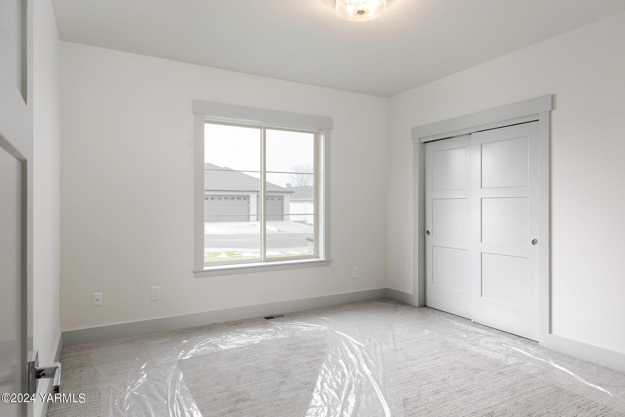 7202 Vista Ridge Avenue Yakima, WA 98903 - Photo 21 of 24 a view of an empty room with a window