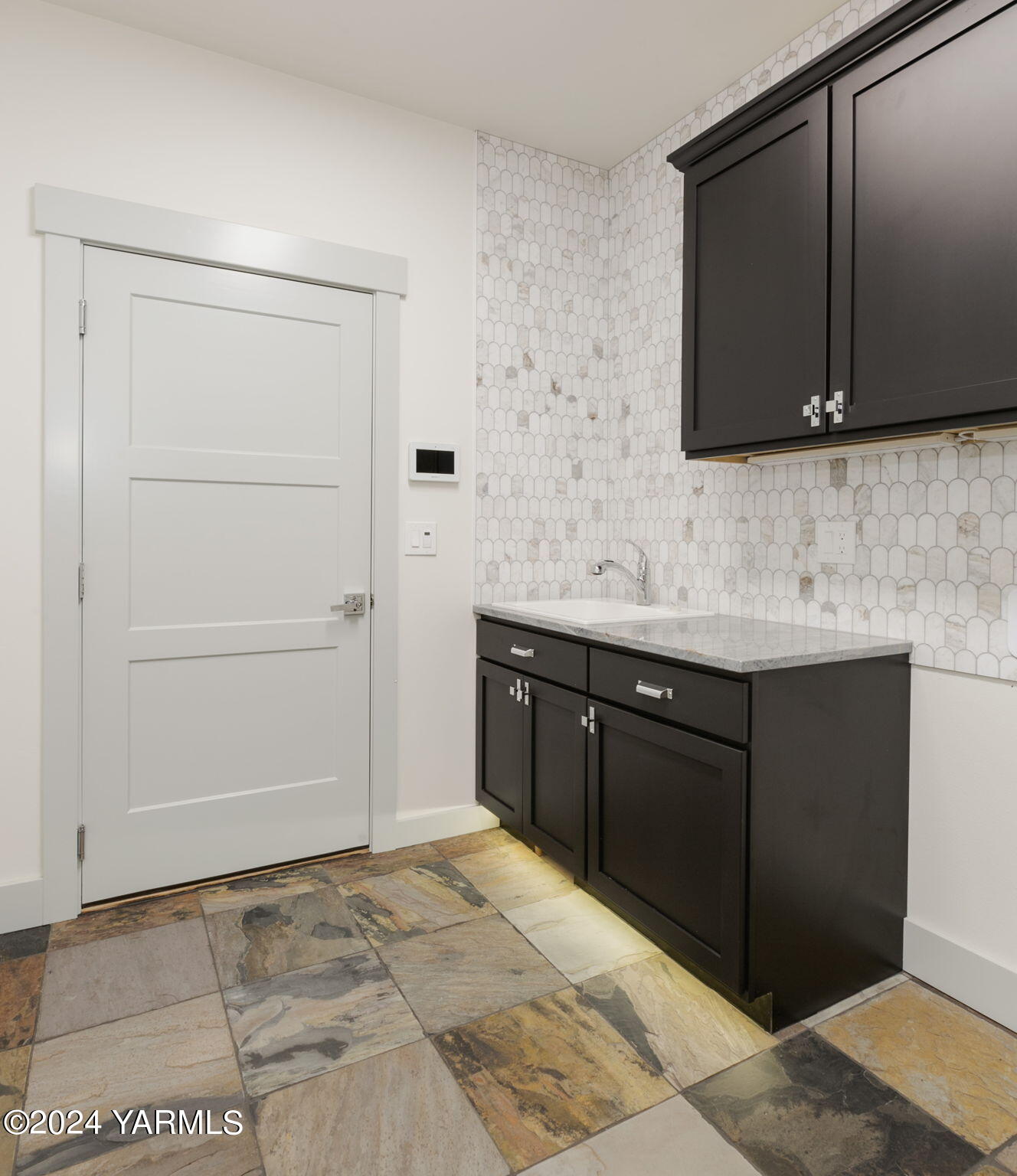 7202 Vista Ridge Avenue Yakima, WA 98903 - Photo 24 of 24 a bathroom with a sink and a mirror