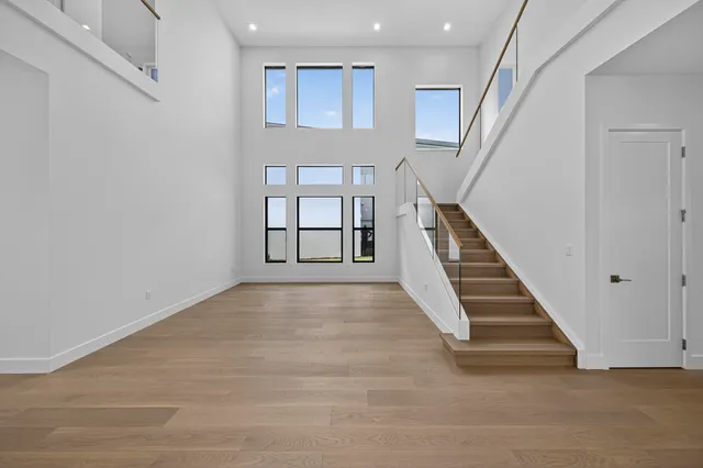a bathroom with a sink toilet a mirror and shower
