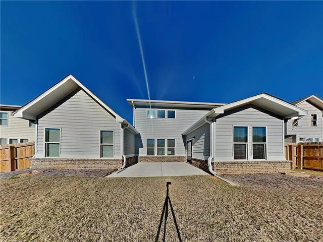 a picture of a bathroom with a shower