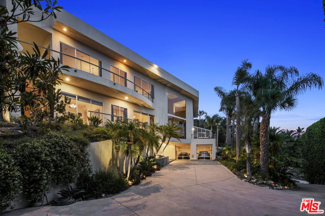 a view of a building with a yard