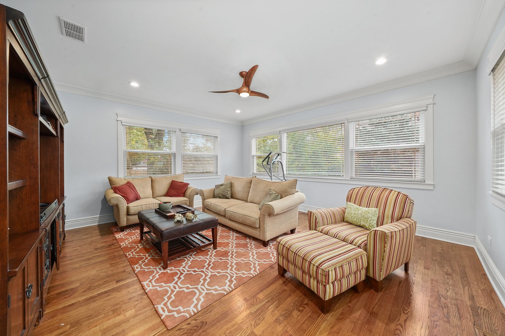 295 Herrick Road Riverside, IL 60546 - Photo 14 of 32 a living room with furniture and a flat screen tv