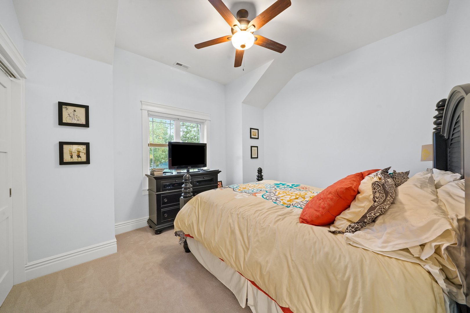 295 Herrick Road Riverside, IL 60546 - Photo 20 of 32 a bedroom with a bed and a flat screen tv