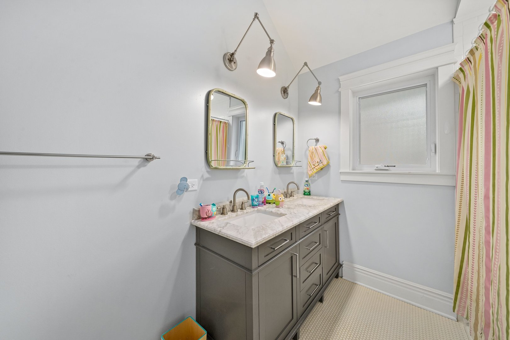 295 Herrick Road Riverside, IL 60546 - Photo 22 of 32 a bathroom with a sink vanity and mirror