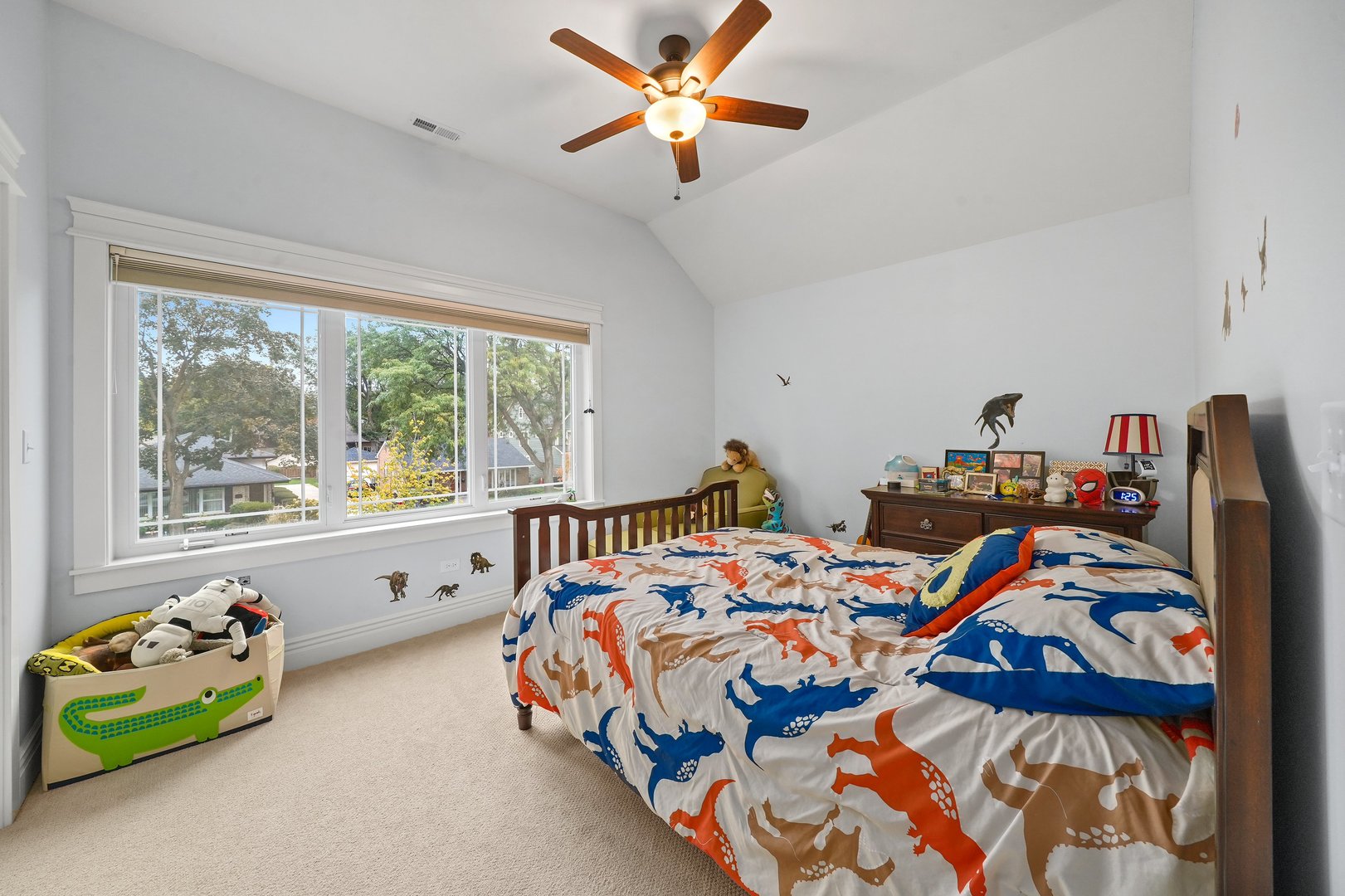 295 Herrick Road Riverside, IL 60546 - Photo 25 of 32 a bed room with two beds and a chandelier