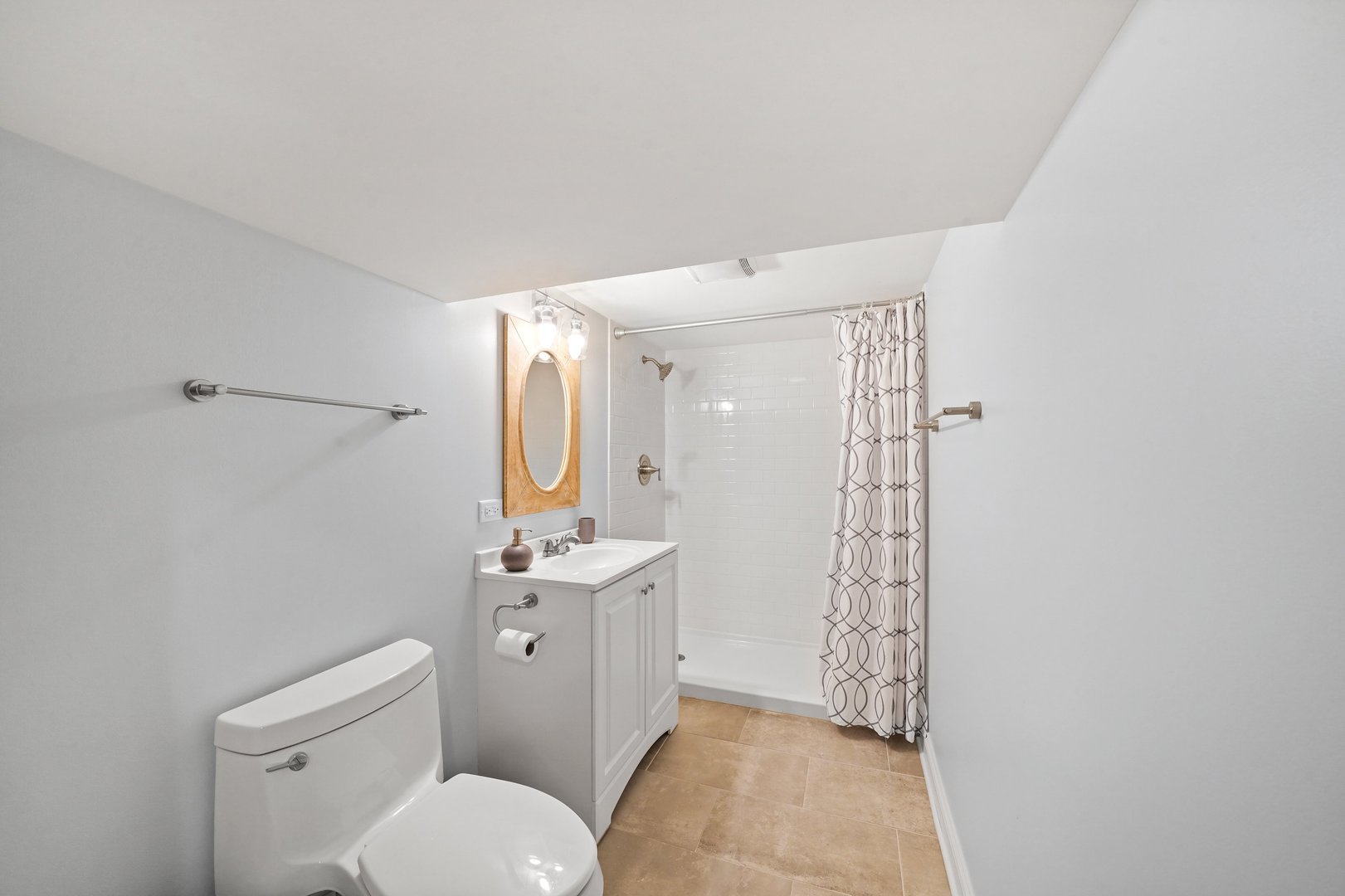 295 Herrick Road Riverside, IL 60546 - Photo 27 of 32 a bathroom with a sink a toilet and shower