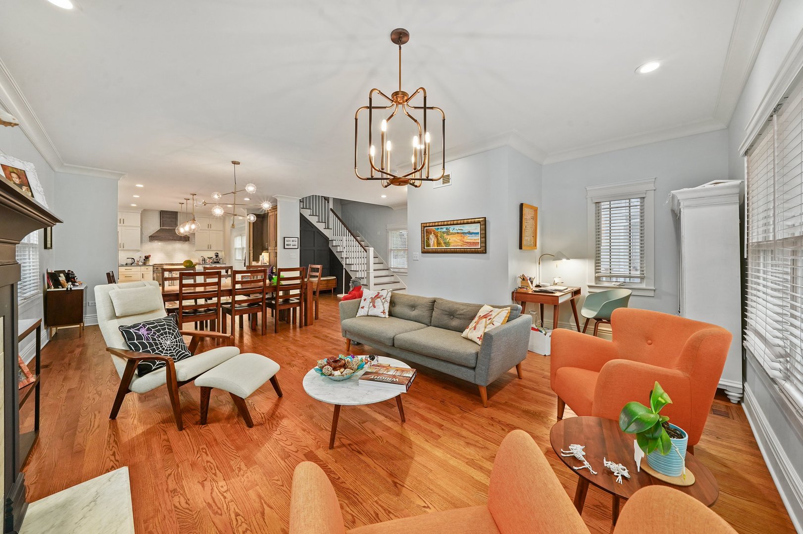 295 Herrick Road Riverside, IL 60546 - Photo 6 of 32 a living room with furniture kitchen view and a chandelier