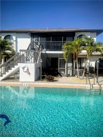 a view of a chairs and tables in the patio
