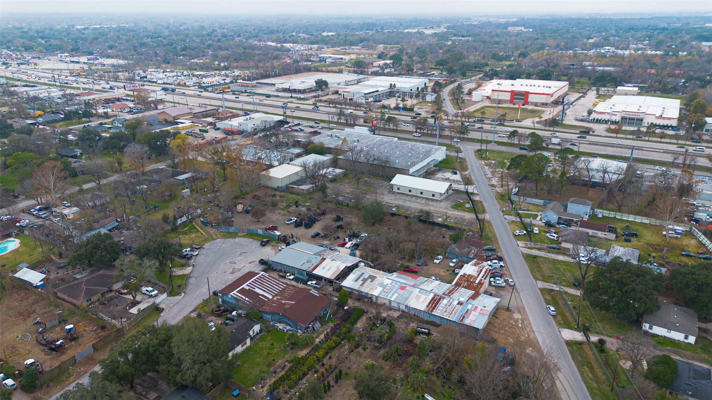 521 Blue Bell Road Houston, TX 77037 - Photo 24 of 29 an aerial view of a city with lots of residential buildings