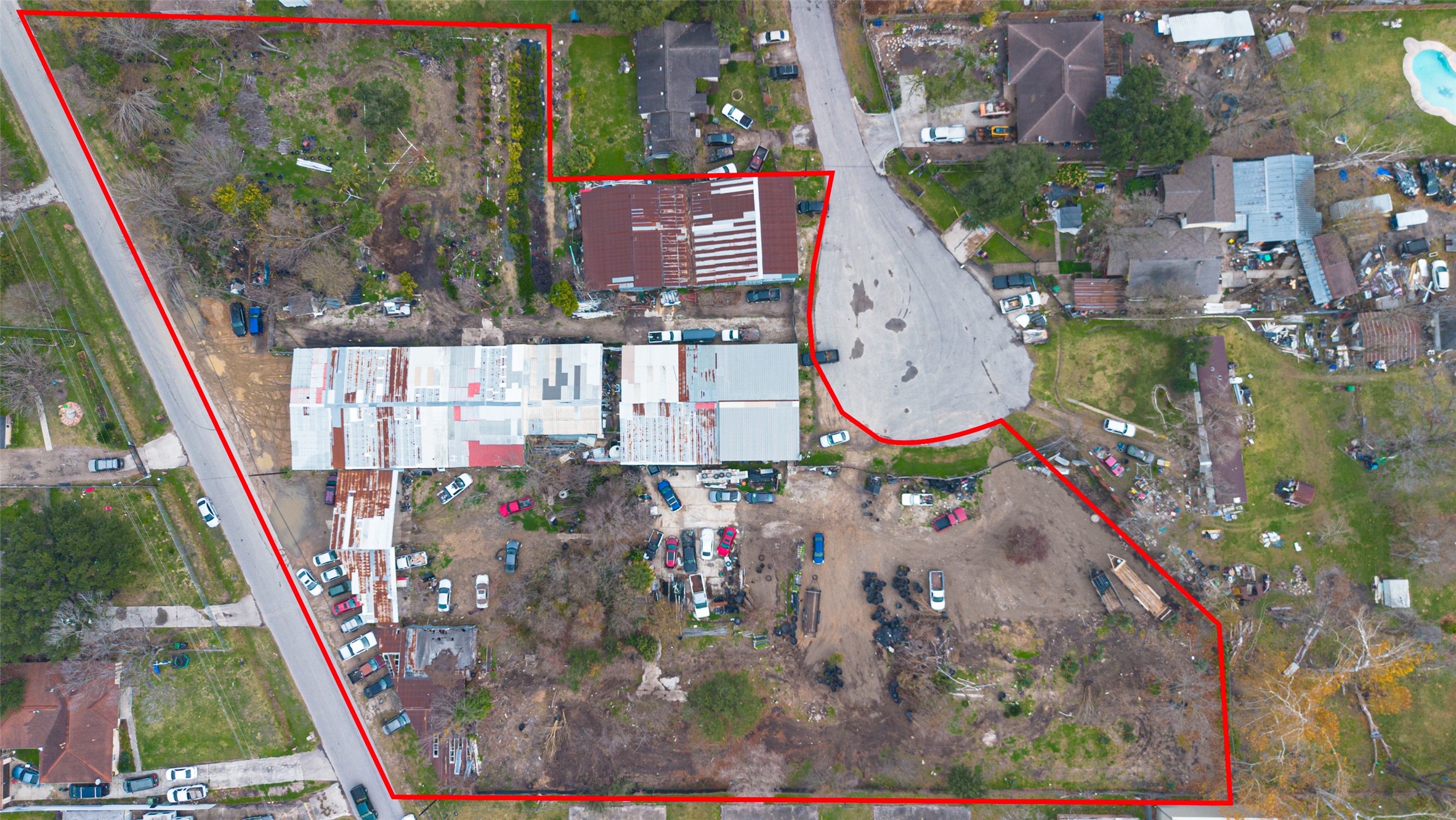 521 Blue Bell Road Houston, TX 77037 - Photo 10 of 29 an aerial view of a house with a garden and swimming pool