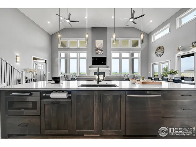 a kitchen with a sink a cabinets and window