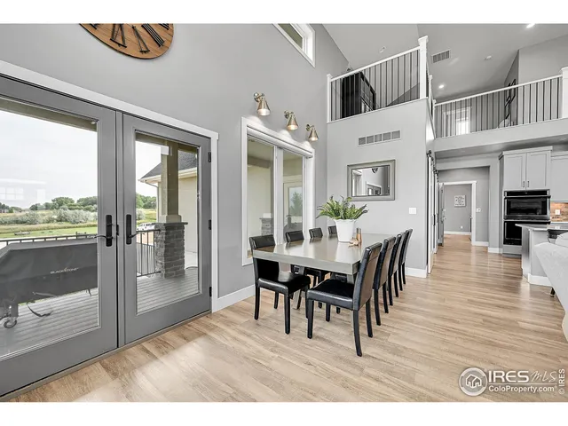 a kitchen with a refrigerator and a sink